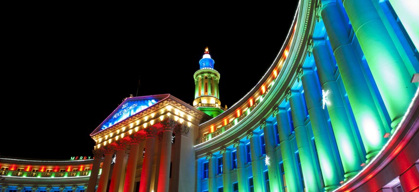 The Denver City-County Building all lit up in a holiday display.