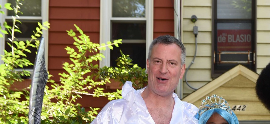 New York City Mayor Bill de Blasio and his family dressed up for the Mermaid Parade in June.