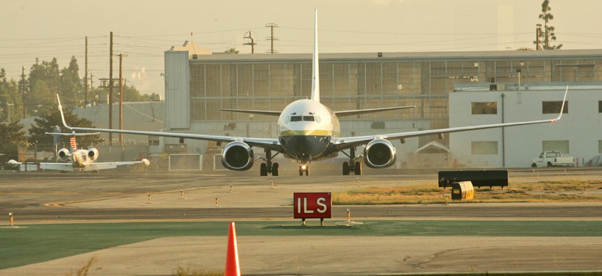 A plane lands at Bob Hope Airport, which is located somewhere in the Los Angeles area. 