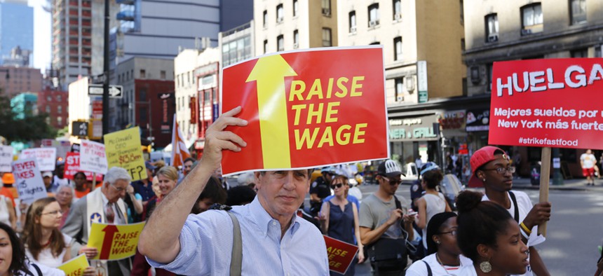 Workers rally in New York in September.