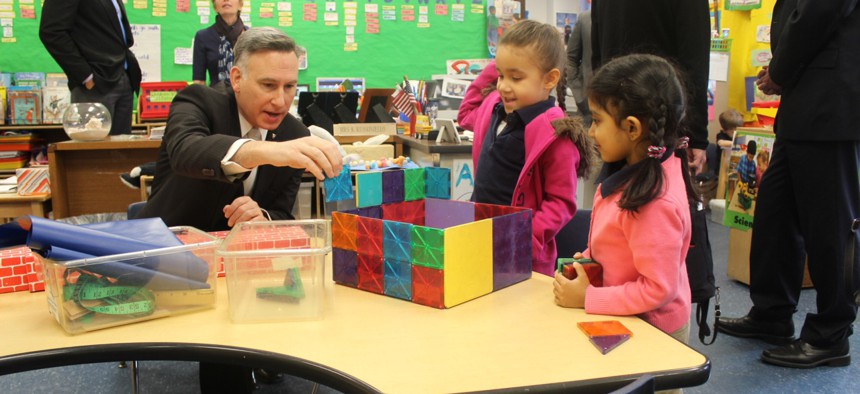 King County Executive Dow Constatine visits an elementary school in Seattle.