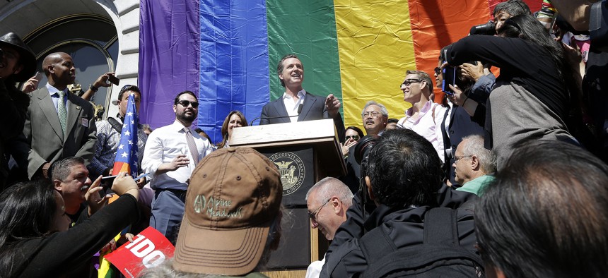 California Lt. Gov. Gavin Newsom, who previously served as San Francisco mayor, speaks at a news conference outside of City Hall in San Francisco, Friday, June 26, 2015, 