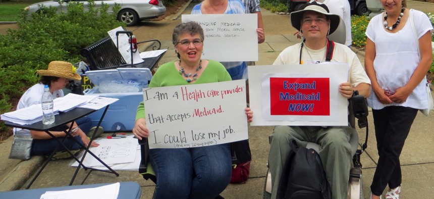A rally supporting Medicaid expansion in June 2013 in Jackson, Mississippi. The state continues to refuse federal funds to implement the Affordable Care Act.