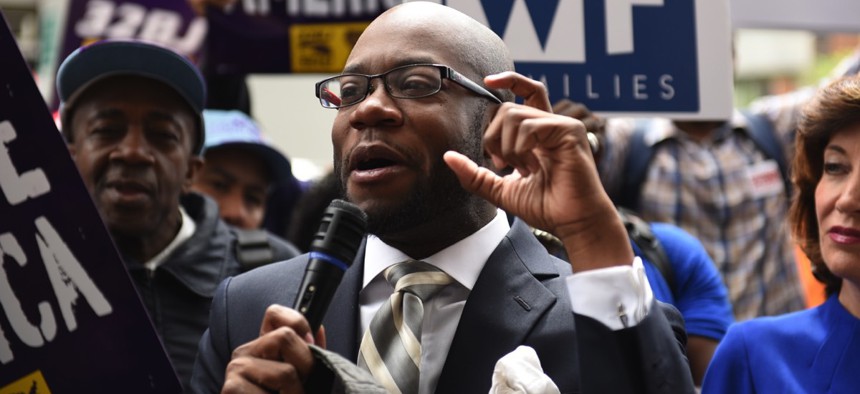 Rev. Willie Francois and other labor activists gathered May 20 along Varick Street in New York City to urge the municipal Wage Board to seek a $15 per hour minimum wage.