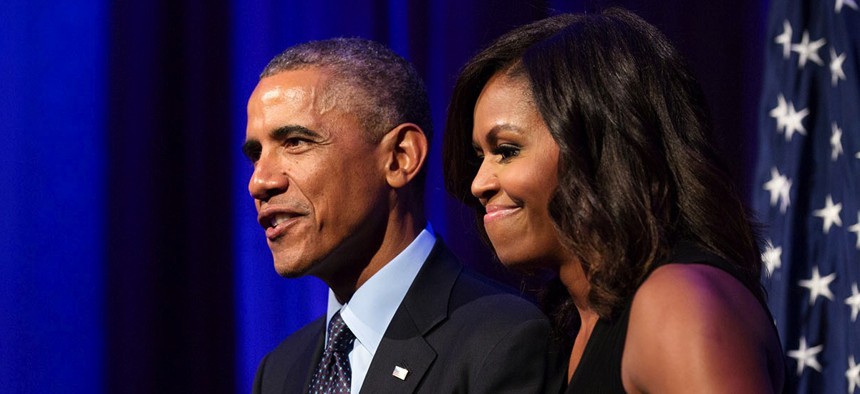 President Barack Obama, with First Lady Michelle Obama, delivers remarks during a reception for foreign heads of delegation to the United Nations General Assembly, at the Waldorf Astoria Hotel in New York, Sept. 23, 2014.