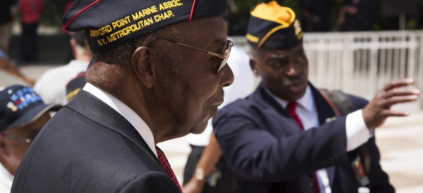 A veteran attends the annual Memorial Day Observance service at the Soldiers and Sailors Monument in Manhattan during Fleet Week NY 2015.