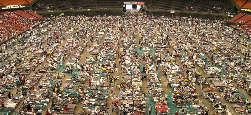 The floor of Houston's Astrodome is covered with cots and evacuees from hurricane-ravaged New Orleans Friday, Sept. 2, 2005.