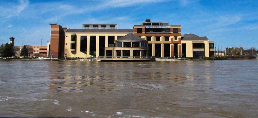 The Grand Rapids Public Museum sits just above the Grand River during floods in April 2013.