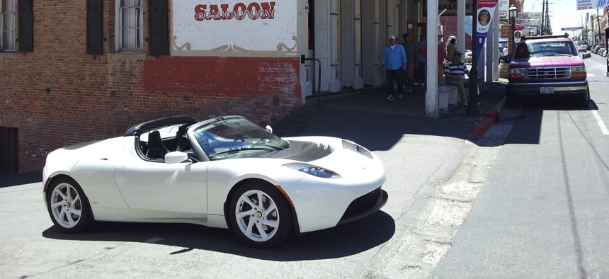 A Tesla outside a Nevada saloon.