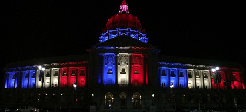 San Francisco City Hall was illuminated in the colors of the French flag following Friday's terrorist attacks in Paris.