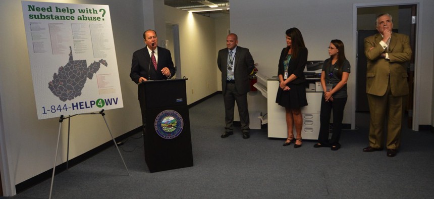 Gov. Earl Ray Tomblin joined West Virginia Department of Health and Human Resources officials on Tuesday, September 9, 2015, in Charleston, to launch 844-HELP4WV, the statewide 24-hour substance abuse and mental health call line.