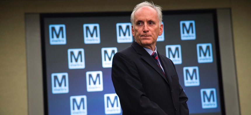 Metro General Manager Paul Wiedefeld listens to a question during a news conference to announce that the D.C. Metrorail service will be shut down for a full day.