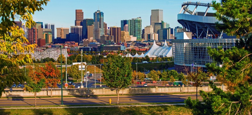 Denver, Colorado's cityscape with Mile High Stadium on the right.
