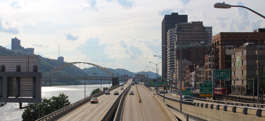 Traffic moves along Interstate 376 in downtown Pittsburgh after rush hour on a recent evening in May.