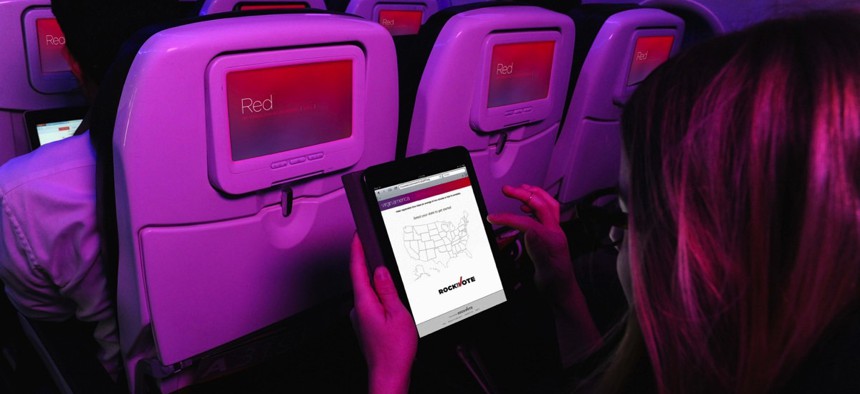 A Virgin America flyer uses Rock the Vote's platform to register to vote.
