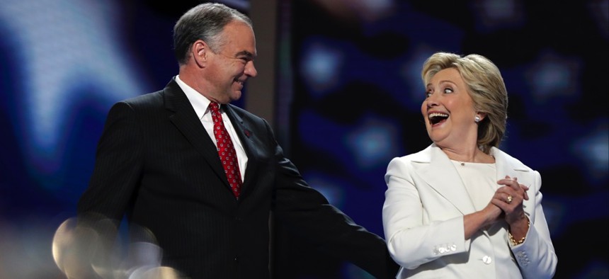 Democratic presidential nominee Hillary Clinton is joined by party vice presidential candidate Sen. Tim Kaine after her speech during the final day of the Democratic National Convention in Philadelphia on July 28.