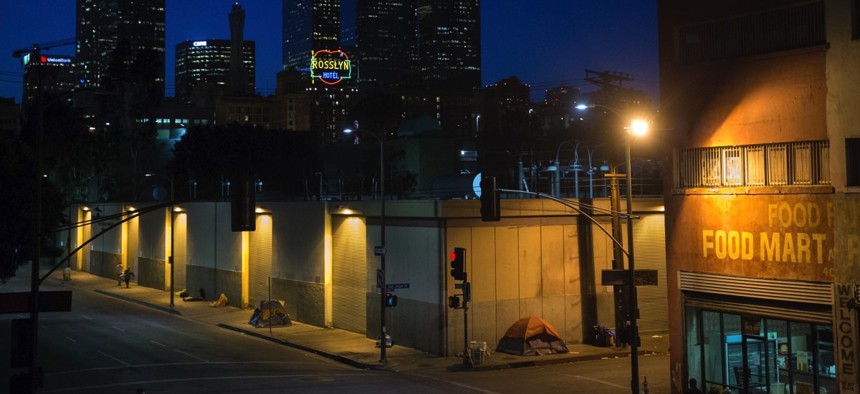 Homeless people sleep in the Skid Row area of downtown Los Angeles.