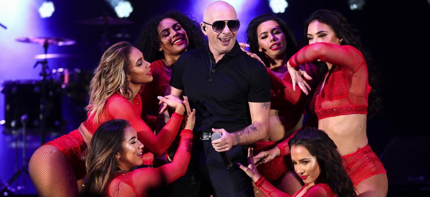 Pitbull performs at the 4th Annual "We Can Survive" Concert held at the Hollywood Bowl on Saturday, Oct. 22, 2016, in Los Angeles. 