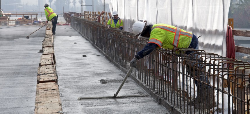 Workers on the Fresno River Viaduct that will carry the future California High Speed Rail corridor through the Fresno area.