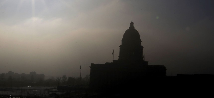 The Utah State Capitol is silhouetted against the smog-covered sky Wednesday, Feb. 6, 2013, in Salt Lake City.