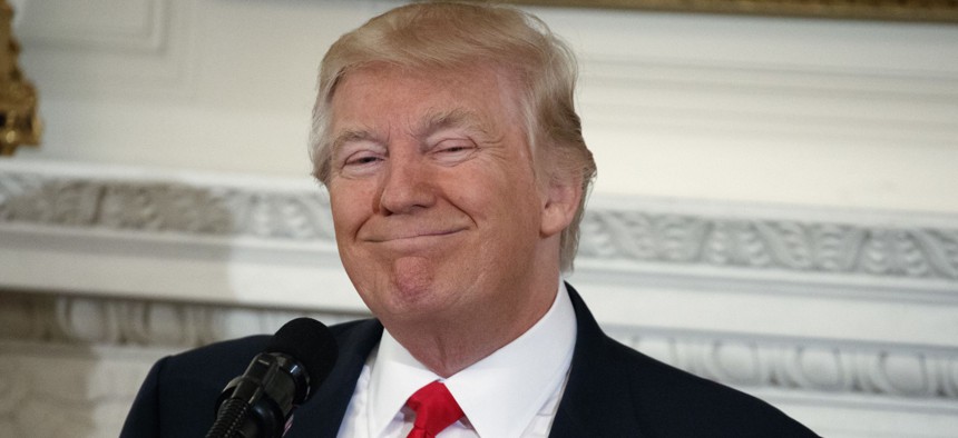 President Donald Trump smiles while speaking to a meeting of the National Governors Association, Monday, Feb. 27, 2017, at the White House.