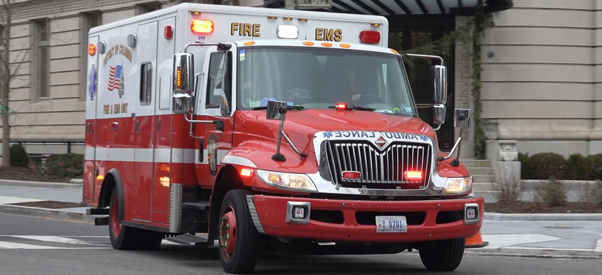 An ambulance travels through Washington, D.C.'s Dupont Circle neighborhood.