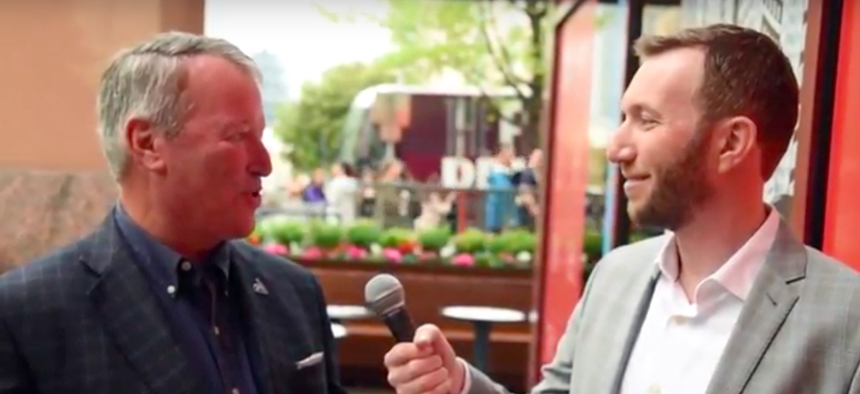 Route Fifty's Mitch Herckis interviews Orlando Mayor Buddy Dyer in Austin.