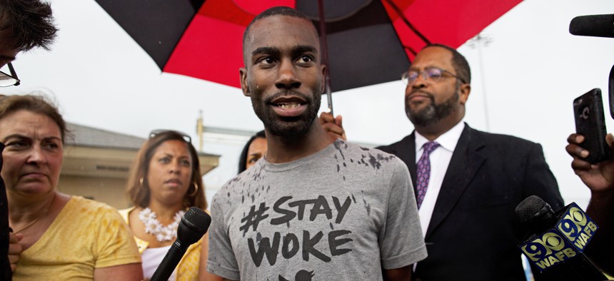 Black Lives Matter activist DeRay Mckesson talks to the media after his release from the Baton Rouge jail in Baton Rouge, La.