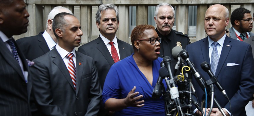 Gary, Ind. Mayor Karen Freeman-Wilson and other mayors speak outside the Justice Department.