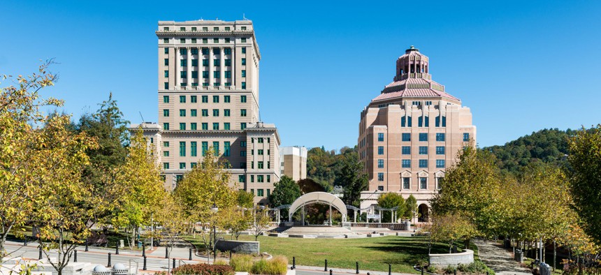Buncombe County Courthouse (left) and the City Building (right) from Pack Square Park in Asheville, North Carolina. 