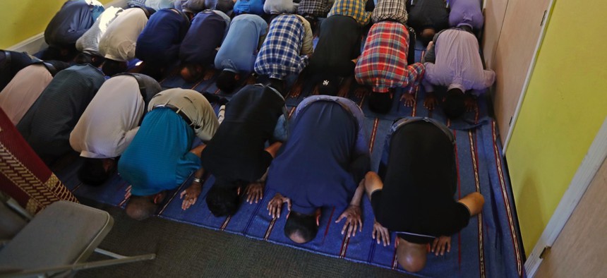Muslim worshippers pray during a service at the Bernards Township Community Center in Basking Ridge, N.J. 