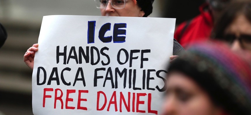 A protester holds a sign during a demonstration protesting the arrest of Dreamer Daniel Ramirez Medina, who was later released, in front of the federal courthouse in Seattle in February.
