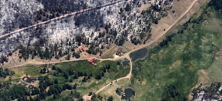 The nation's largest wildfire has forced more than 1,500 people from their homes and cabins in a southern Utah mountain area.