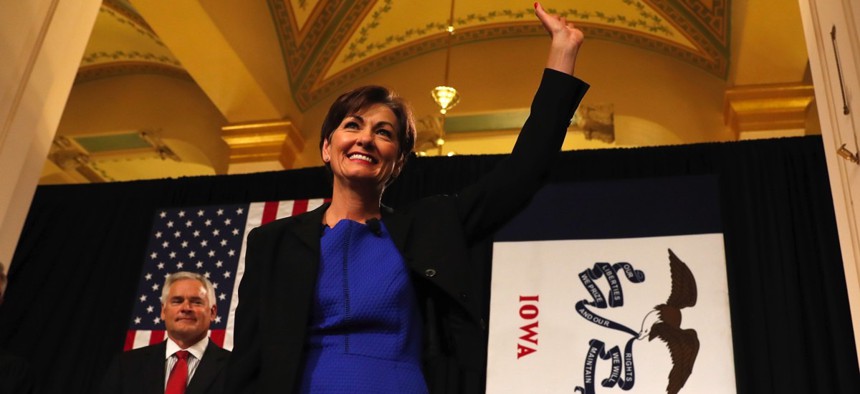 Iowa Gov. Kim Reynolds is being pressured by the state's treasurer to change legislative protocols after settling a lawsuit with a woman accusing GOP senators of sexual harassment.