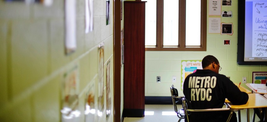 A juvenile resident sits in a classroom at the Department of Juvenile Justice's Metro Regional Youth Detention Center, in Atlanta.