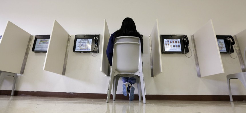 A visitor uses the video visitation system at the Fort Bend County Jail to speak with an inmate, in Richmond, Texas. 
