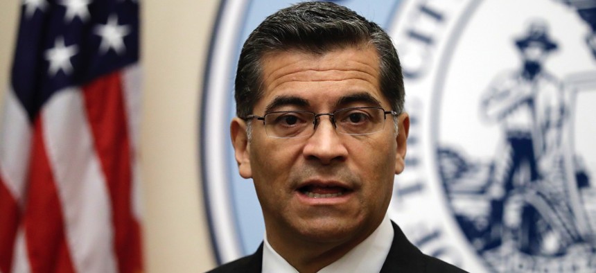 California Attorney General Xavier Becerra speaks during a press conference at San Francisco City Hall on Monday.