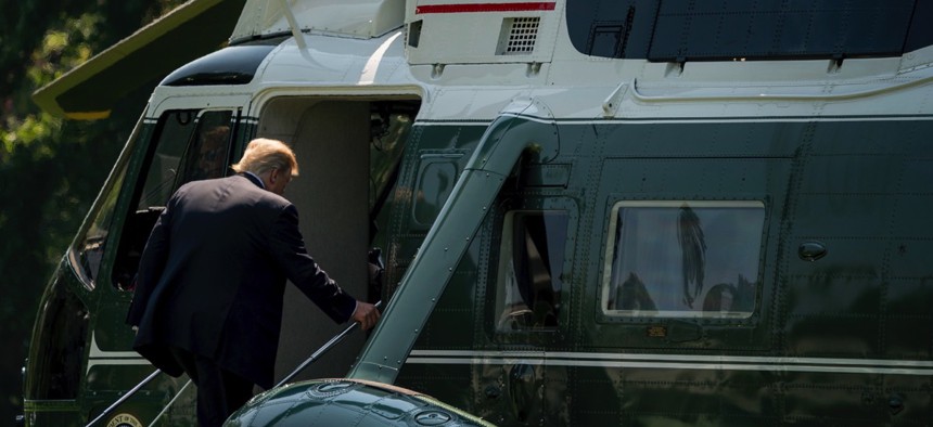 President Donald Trump boards Marine One on the South Lawn of the White House in Washington, D.C. on Tuesday before heading to Arizona.