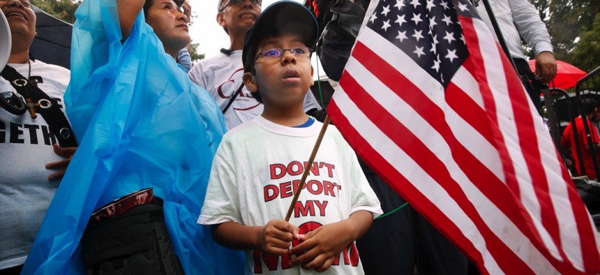 Michael Claros, 8, of Silver Spring, Maryland attends a rally for immigration reform on Aug. 15 outside the White House.