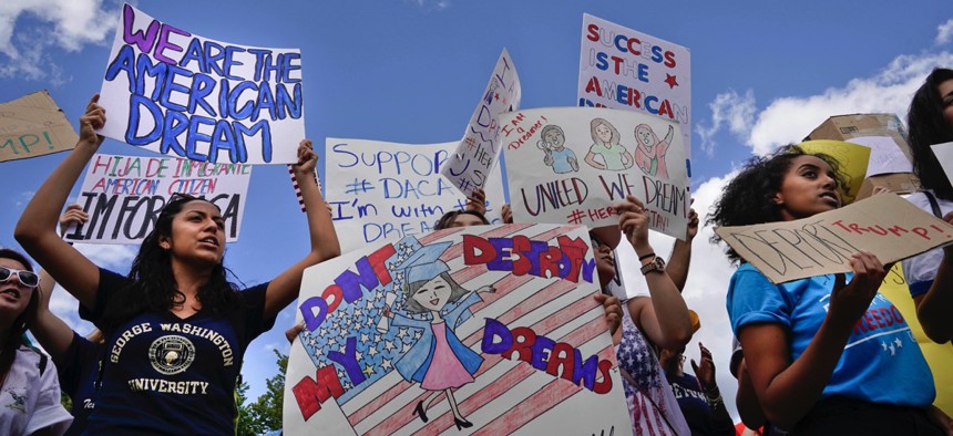 Supporters of the Deferred Action for Childhood Arrival program demonstrate on Pennsylvania Avenue in front of the White House in Washington, D.C. on Sept. 9.