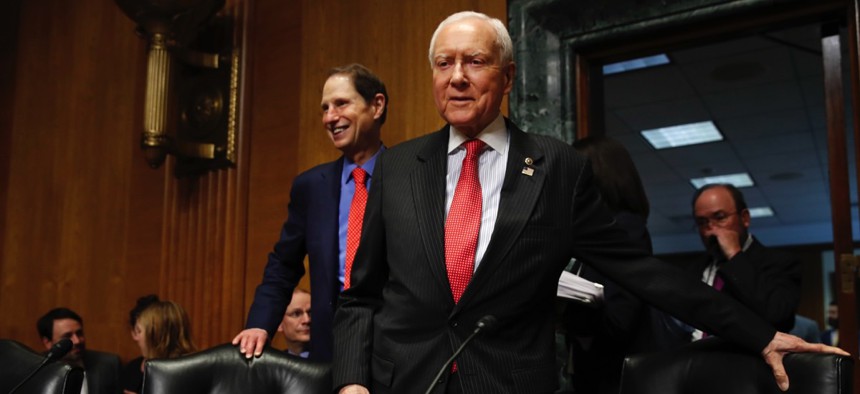 Senate Finance Committee Chairman Orrin Hatch and ranking member Ron Wyden.