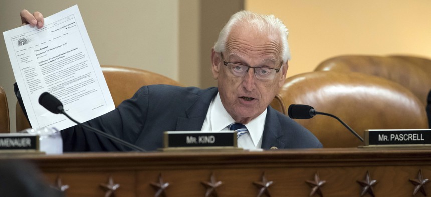Rep. Bill Pascrell, D-N.J., object to the Republican tax plan as he holds up a letter from the New Jersey Chamber of Commerce during the markup, on Capitol Hill in Washington, Monday, Nov. 6, 2017.