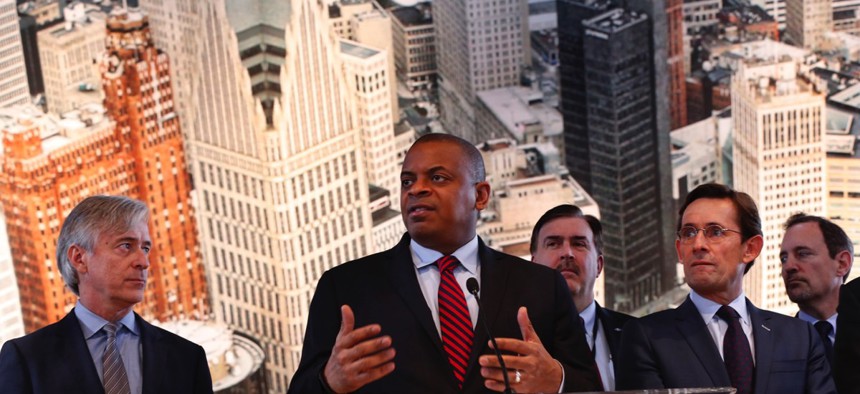 Former U.S. Transportation Secretary Anthony Foxx speaks to auto executives at the 2016 North American International Auto Show in Detroit.
