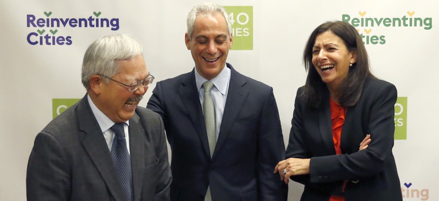 Chicago Mayor Rahm Emanuel, center, shares a laugh with fellow mayors Mayor Ed Lee, of San Francisco, left, and Mayor Anne Hidalgo, of Paris, at the North American Climate Summit in Chicago.