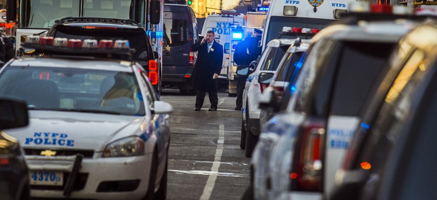 Police block a street by Port Authority Bus Terminal near New York’s Times Square following an explosion on Monday, Dec. 11, 2017