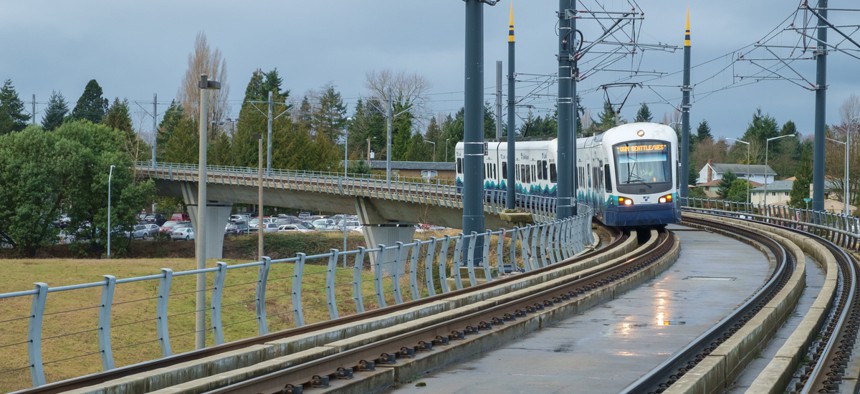 A Sound Transit Link light-rail train travels along its route through Tukwila.