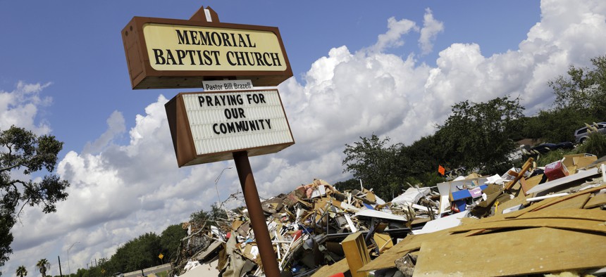 Debris sits outside the Memorial Baptist Church in Port Arthur, Texas, Monday, Sept. 25, 2017. The church was damaged by Hurricane Harvey floodwaters. 
