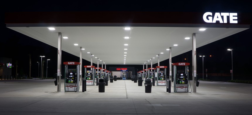 A gas station at night in Florida, during 2014.