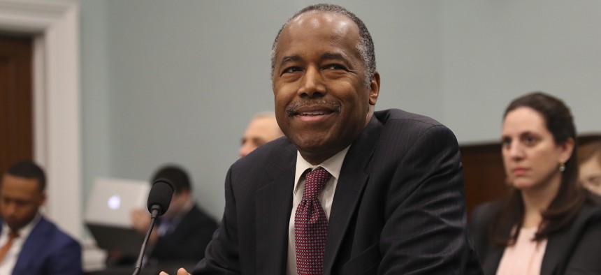 Housing and Urban Development Secretary Ben Carson takes his seat before testifying before a House Committee on Appropriation subcommittee hearing on Capitol Hill in Washington, Tuesday, March 20, 2018. 