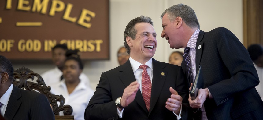 New York Gov. Andrew Cuomo, left, and New York City Mayor Bill de Blasio at the Wilborn Temple First Church of God In Christ in Albany, N.Y. on Feb. 16, 2014.  